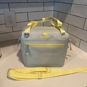 Stanley Yellow and Blue Travel Bag with Durable Design